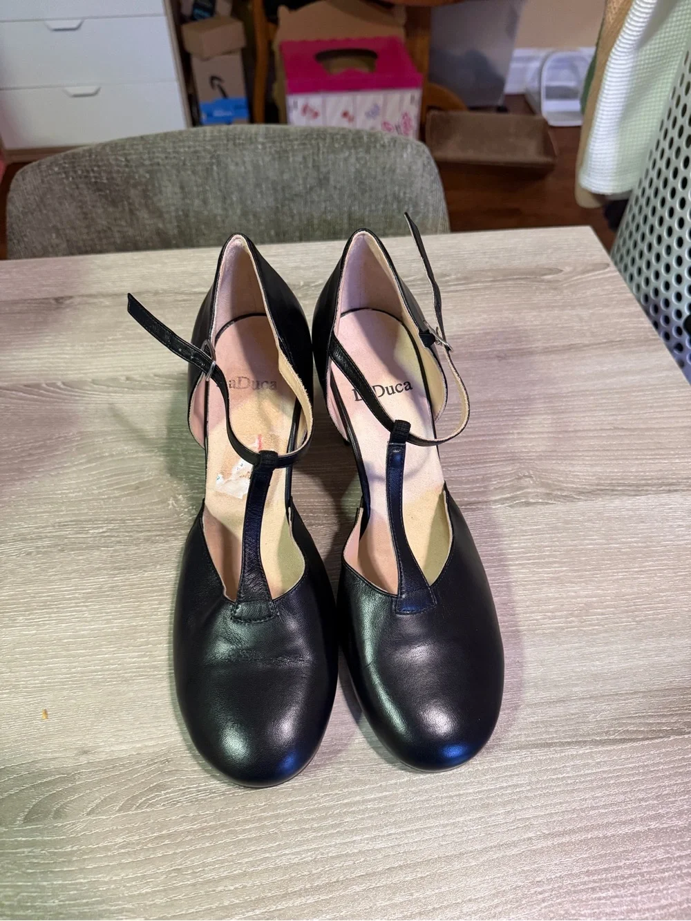 LaDuca Leather T‑Strap Heels in Black